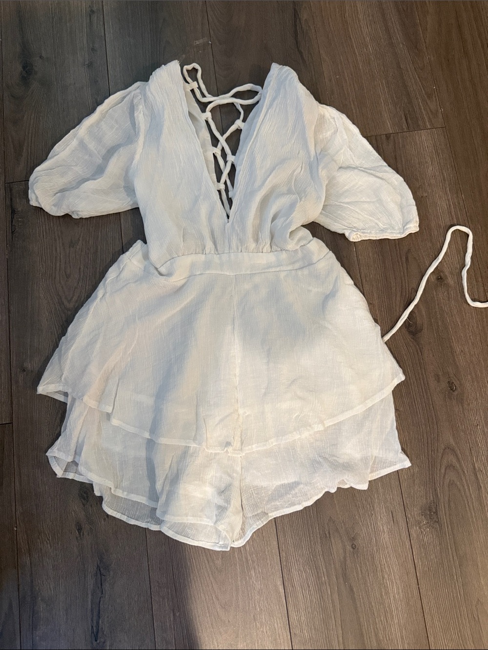 Fashion Nova White Tiered Romper with Lace-Up V-Neck